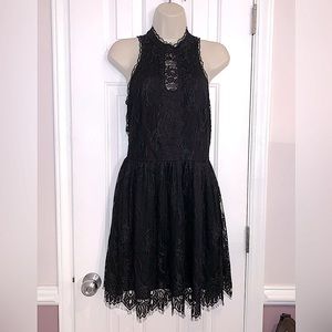 NAF NAF Paris lacy eyelash dress with cut outs little black dress size Medium